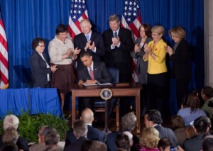 President Barack Obama signs a presidential memorandum at the America's Great Outdoors Conference at the Department of the Interior in Washington, D.C. April 16, 2010. (Official White House Photo by Samantha Appleton)